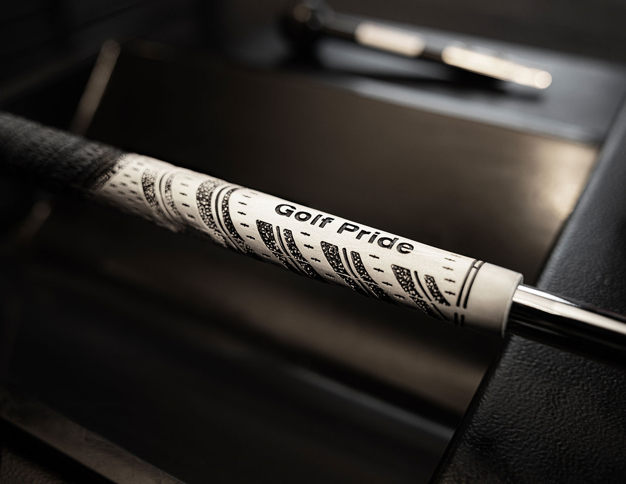 a worn golf grip that needs to be replaced